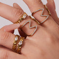 Crystal Cross and Leaf Band Open Rings in Gold Tone view 1