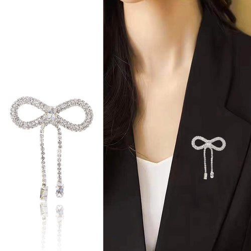 Bow tassel brooch product shot and worn on black blazer lapel