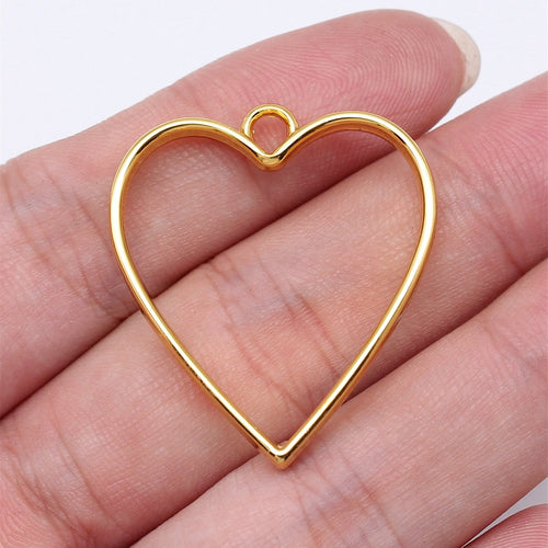 Open Heart Resin Frame Charms hand-held front view