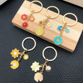 Five Colorful Daisy Flower Metal Keychain Design Set view 2