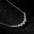 Graduated Clear Stone Curved Bar Necklace In Polished Silver Tone view 4