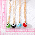 Gold Tone Round Glass Evil Eye Pendant Necklaces in Eight Colors view 5