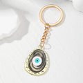Irregular Oval Resin Evil Eye Keychains Gold Ring 6 Colors view 2