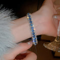 Silver Tone Hinged Crystal Bracelet In Multicolor Blue Or Champagne view 7