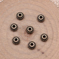 Dotted Round Spacer Beads in Four Antique Metal Finishes view 4