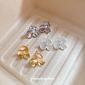 Sculpted Flower Stud Earrings in Gold Tone and White view 3