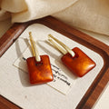 Amber Square Drop and Gold Tone Tapered Bar Earrings view 6