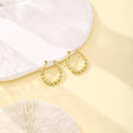 Sixty-Five Gold Tone Sculptural Small Hoop Earrings view 5