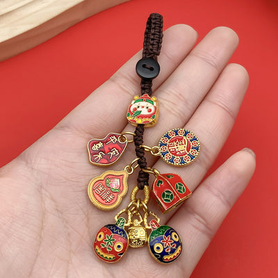 Red assorted shape charms arranged on a light background
