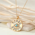 Gold Tone Round Crystal Evil Eye Pendant Necklaces in Two Designs view 2