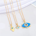 Gold Tone Hamsa and Eyelash Eye Pendant Necklaces in Three Designs view 1