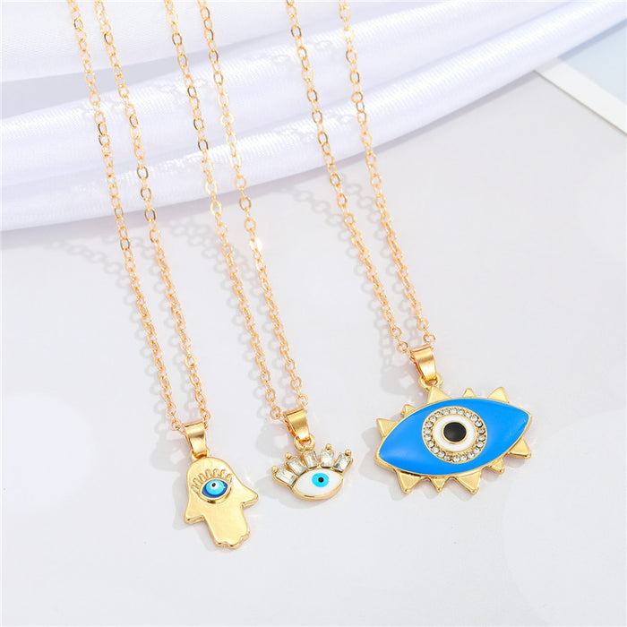 Gold Tone Hamsa and Eyelash Eye Pendant Necklaces in Three Designs