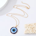 Round Blue Evil Eye Pendant Necklaces in Gold and Silver Tone Sizes view 3