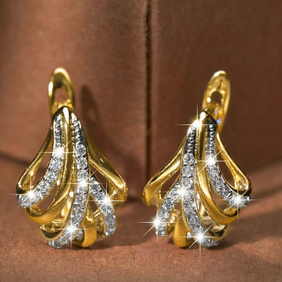 Two Tone Leaf Twist Huggie Hoop Earrings, front view.