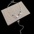 Silver Tone Cross Pendant Necklace with Layered White Beads view 6