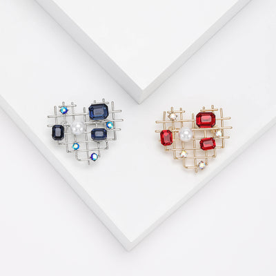 Geometric Open Heart Brooch in Red and Blue displayed from the front
