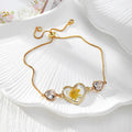 Gold Tone Pressed Flower Crystal Heart Slider Bracelets in Six Designs view 6