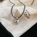 Silver Tone Puffy Heart Pendant Black Cord Necklace view 4