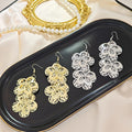 Triple Filigree Flower Gold and Silver Long Hook Earrings view 1