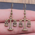 Balance Scale Dangle Earrings in Silver and Bronze Tones view 4