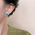 Turquoise Square Cabochon Stud Earrings Cream Gold Frame view 2