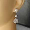Three Stone Crystal Drop Earrings in Polished Metal view 3