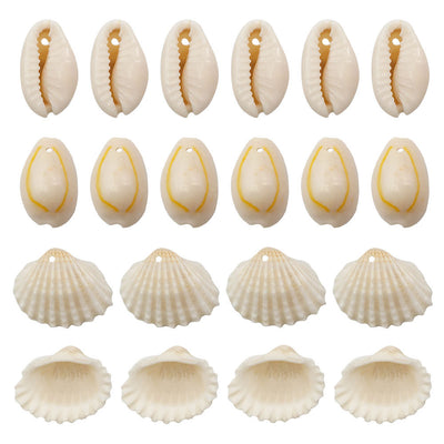 Yellow seashell charms arranged on a light background