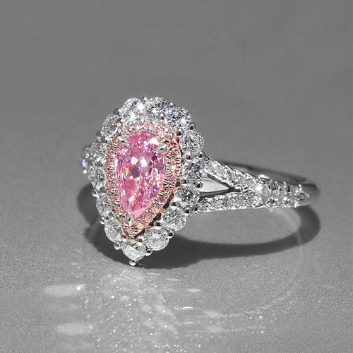 Second product view showing silver-tone pink pear-shaped double-halo ring