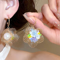 Gold Wire Flower Earrings With Colorful Beads With Polished Metal Details view 3