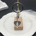 Antique Silver Winged Heart and Flying Dove Keychain view 2