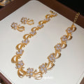 Gold Pearl Bow Ribbon Necklace Matching Stud Earrings view 3