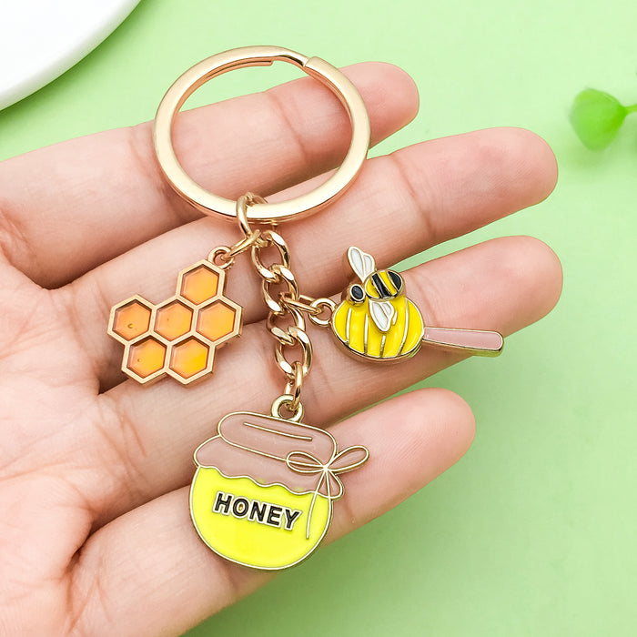 Bee and Honeycomb Charm Keychains Featuring Yellow Bee Across 33 Pictured Variations