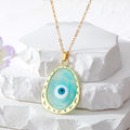 Gold Tone Oval Resin Evil Eye Pendant Necklaces in Six Colors view 4