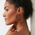 Gold Tone Twisted Hoop Earrings in Three Diameter Options view 3