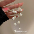White Flower Pearl Long Chain Hook Earrings Statement Pair view 1