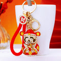 Red Jeweled Wealth Deity Keychain with Gold Tone Hardware view 3