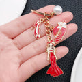 White Black and Red Dress Mannequin Metal Keychain Set view 3