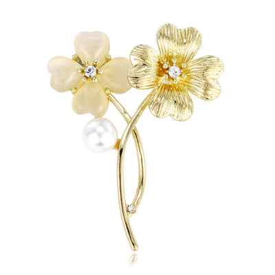 Front product view of an orchid broche with pearl and diamond