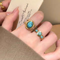 Gold Open Oval Turquoise Cabochon Twisted Band Ring view 3