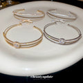 Silver Tone Multirow Open Cuff With Bow Or Round Crystal Center view 2