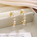White Pearl Look and Black Flower Gold Huggie Earrings view 6