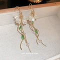 White Flower Green Leaf Pearl Chain Hook Earrings with Polished Metal Accents view 4