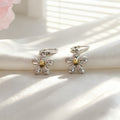Silver Daisy Flower Huggie Hoop Earrings Gold Center view 3