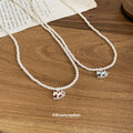 White Beaded Necklace with Blue Enamel Rocking Horse Pendant view 4