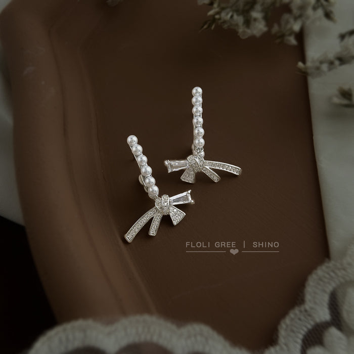 Silver Pearl C-Curve Earrings Crystal Pave Bow Accents