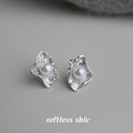 Silver Tone Ruffled Leaf And White Pearl Center Stud Earrings view 4