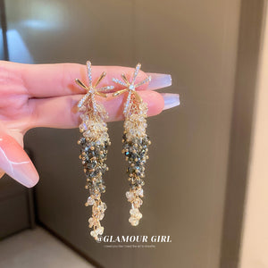Gold Tone Starburst and Crystal Cascade Drop Earrings