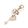 Wooden Love Heart Rabbit Fur Pom Keychains in Fifteen Pictured Fur Colors view 5