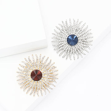 Radiating Crystal Sunburst Brooch in Blue or Purple