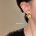 Gold Tone Openwork Flower Stud Earrings Clear Center Stone view 2